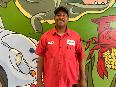 Staff member Burley Thomas from 4e06a75a62aa