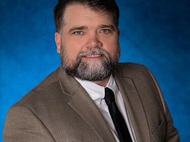 Staff member Andy Robertson from df5e96724458