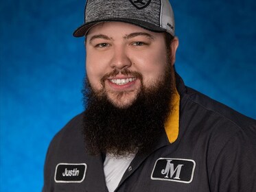 Staff member Justin Shaw from 69a649905fc8