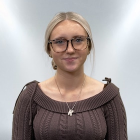 Staff member Kenzie Tholen from 637fed726955