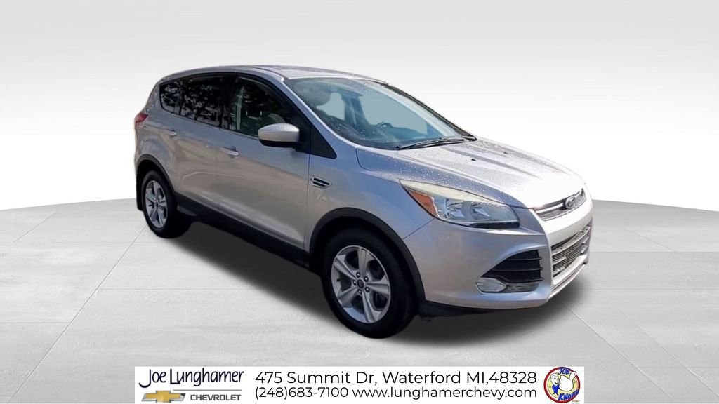 Used 2014 Ford Escape SE with VIN 1FMCU9G9XEUD88280 for sale in Waterford Township, MI