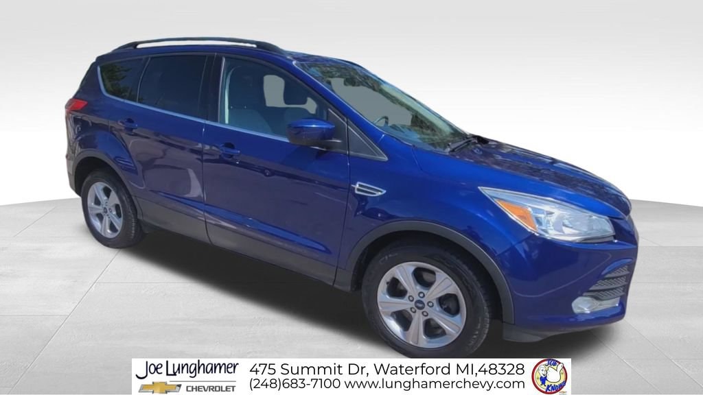 Used 2016 Ford Escape SE with VIN 1FMCU9GX0GUB80670 for sale in Waterford Township, MI