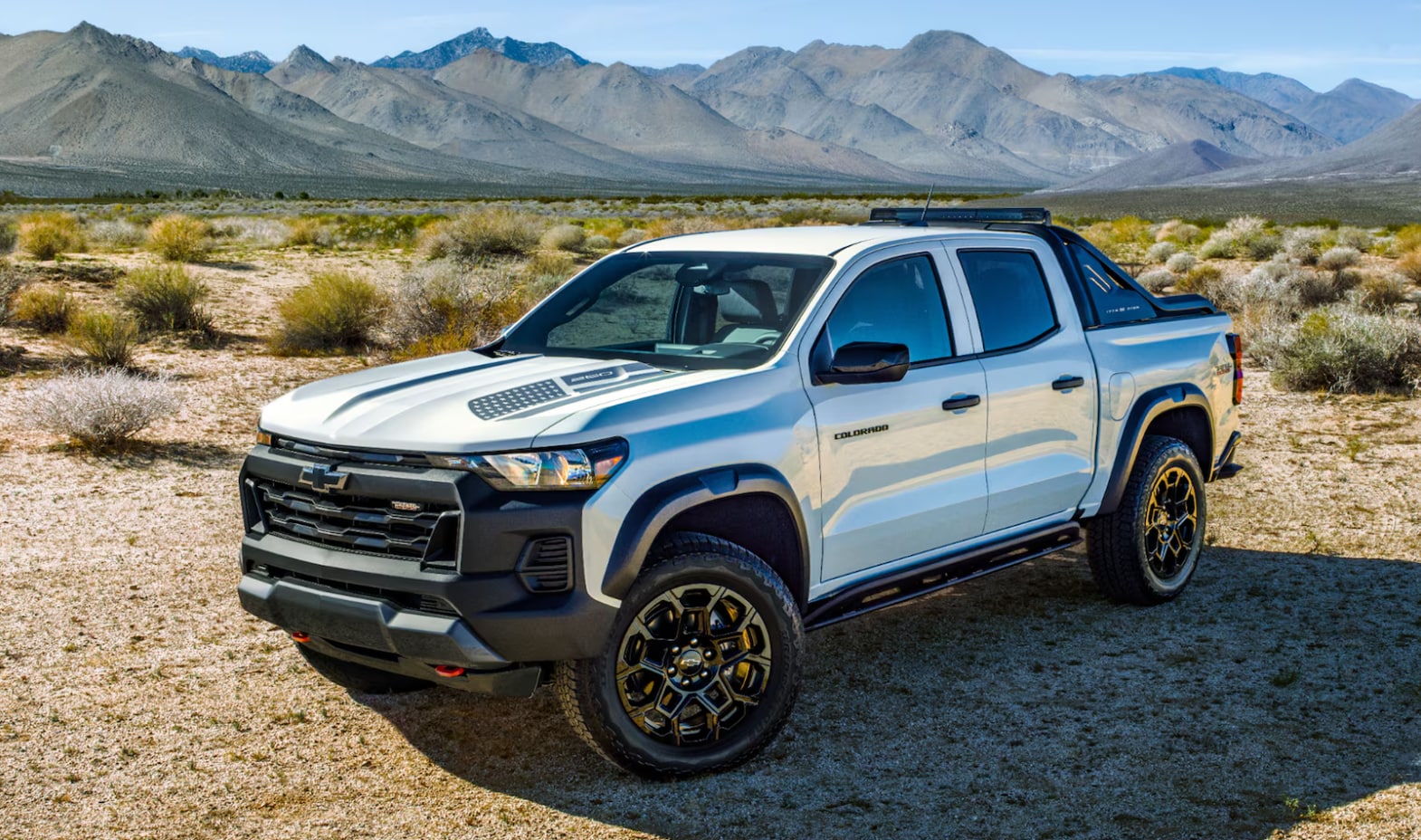 2026 Chevrolet Colorado Trail Boss in desert landscape.