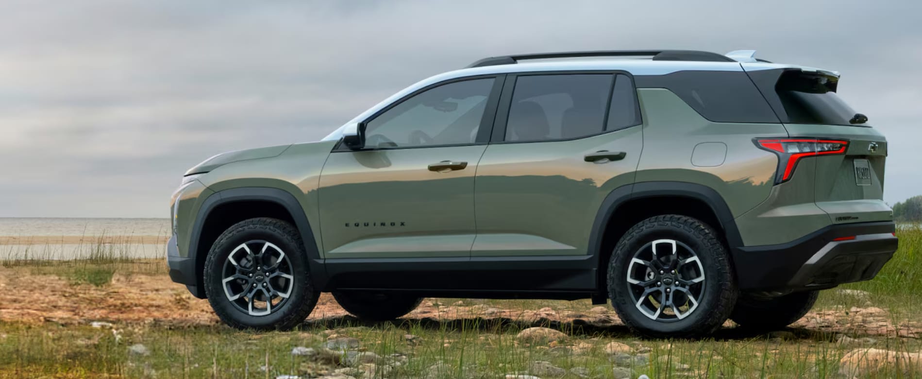 2026 Chevrolet Equinox ACTIV side profile near shoreline.