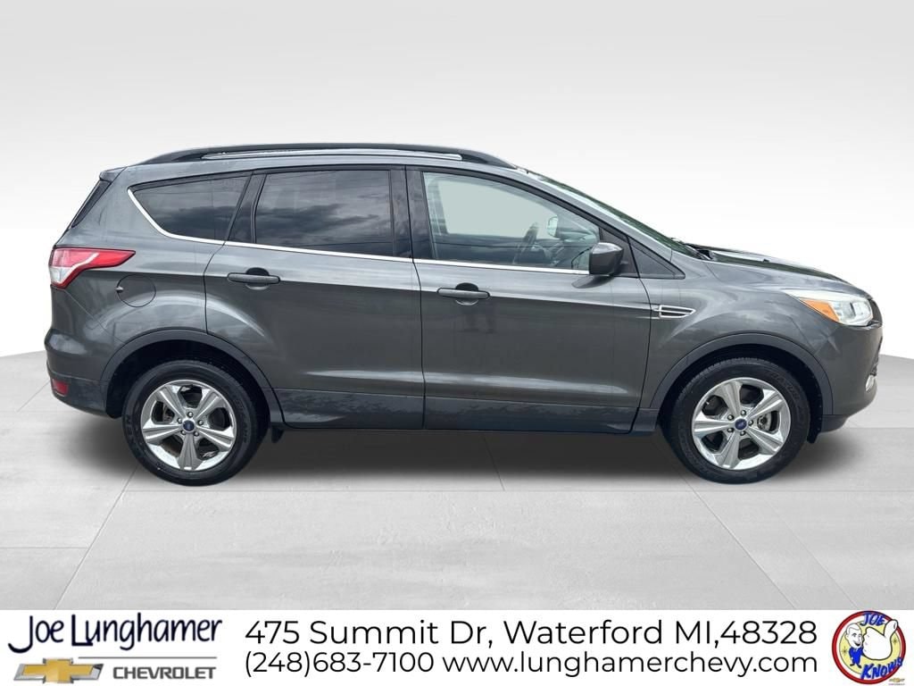 Used 2016 Ford Escape SE with VIN 1FMCU9GX9GUA81927 for sale in Waterford Township, MI