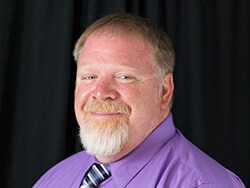 Staff member Gerry Smith from ID_96d2b86e8cdd