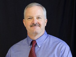 Staff member Jason Lane from ID_96d2b86e8cdd