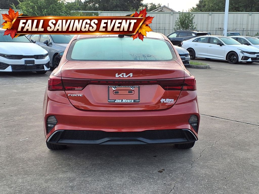 Certified Used 2023 Fire Orange Kia LXS image 8