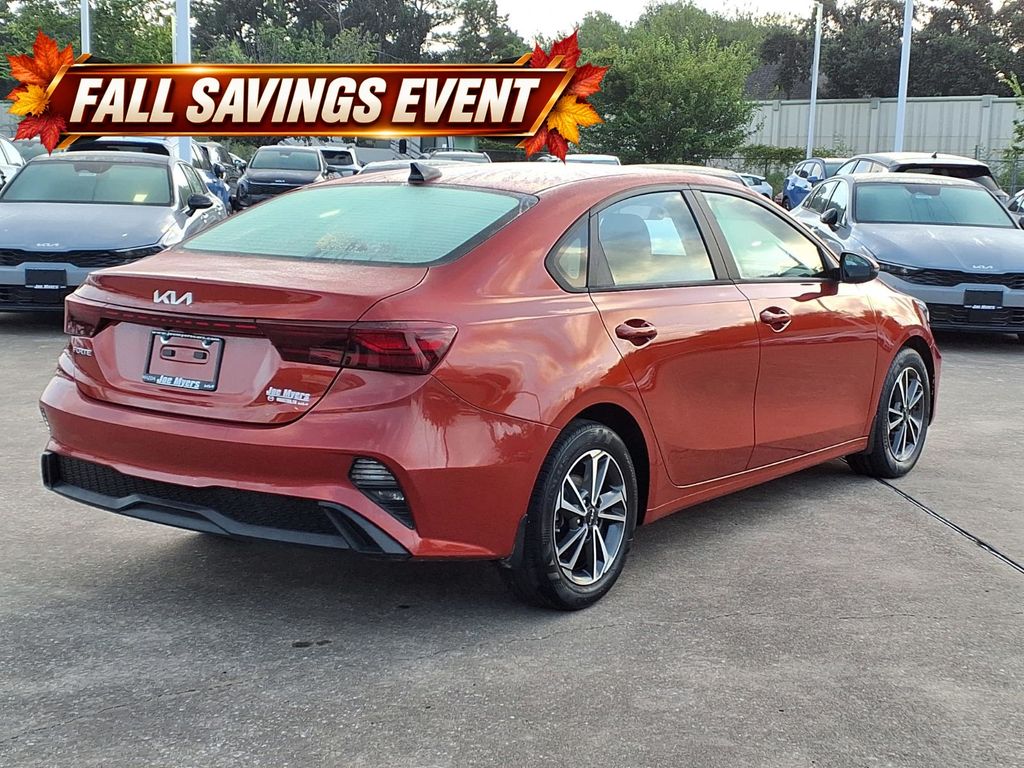 Certified Used 2023 Fire Orange Kia LXS image 4