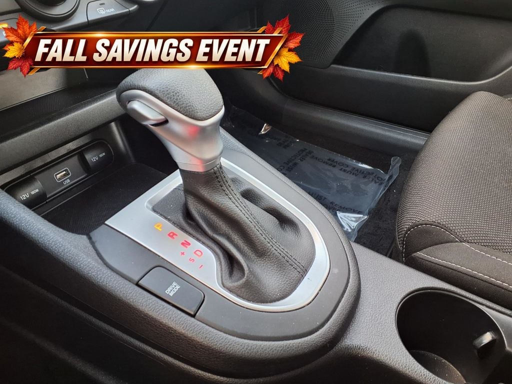 Certified Used 2023 Fire Orange Kia LXS image 18
