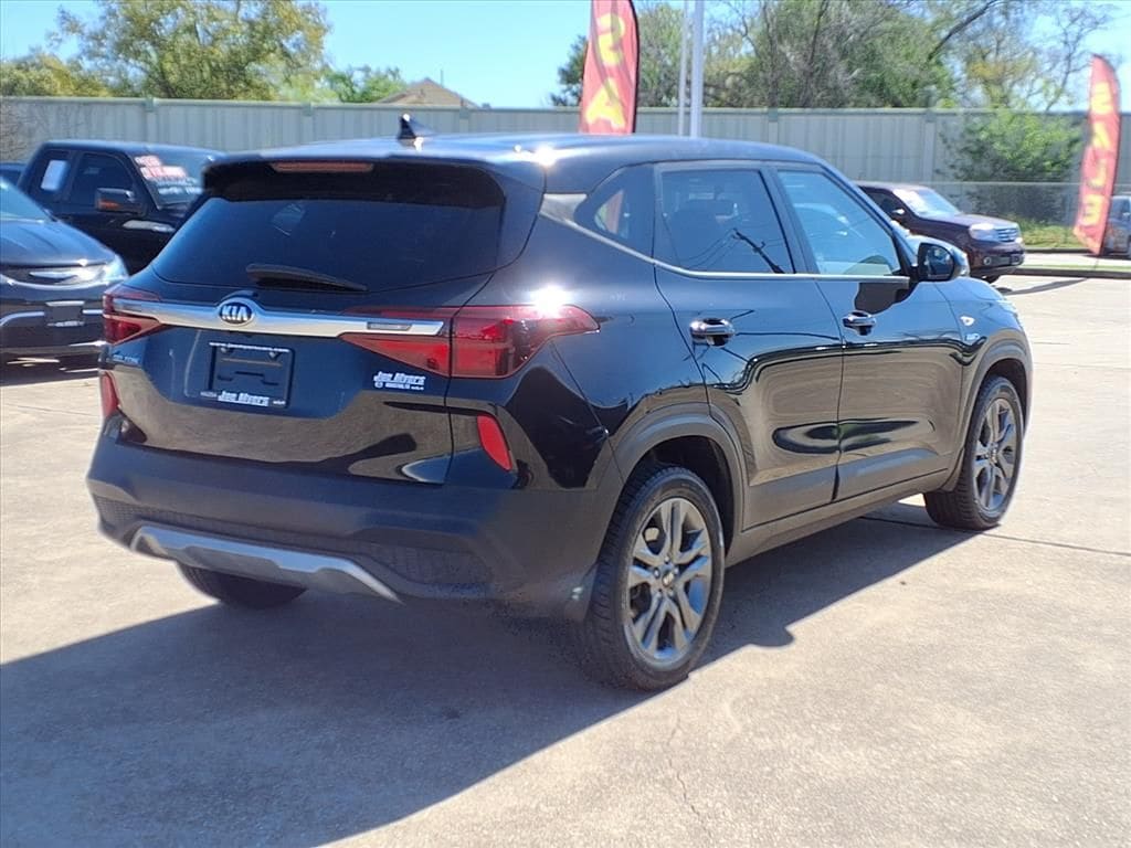 Used 2021 Cherry Black Kia LX image 4