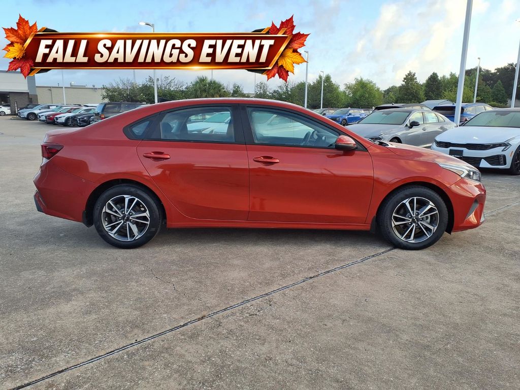 Certified Used 2023 Fire Orange Kia LXS image 6