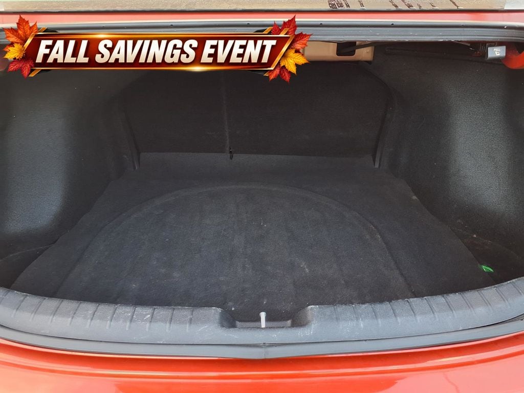 Certified Used 2023 Fire Orange Kia LXS image 12
