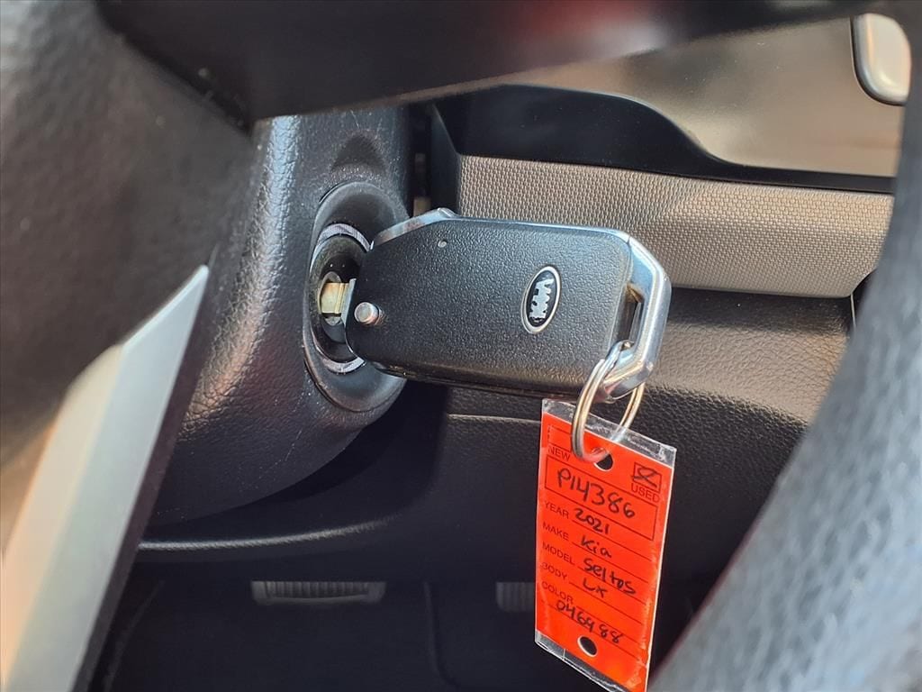 Used 2021 Cherry Black Kia LX image 26
