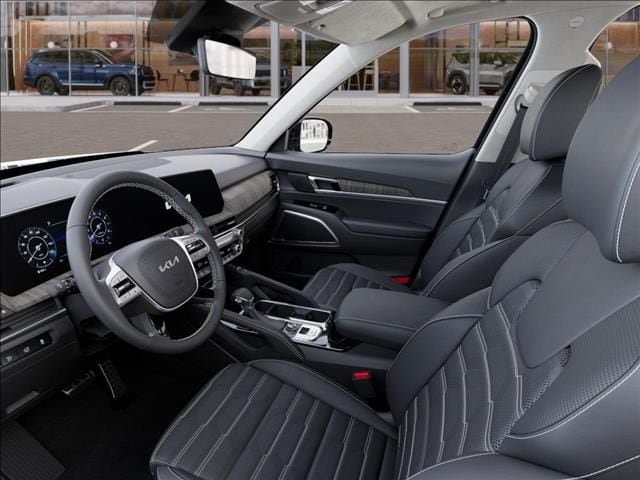 New 2025 Ebony Black Kia SX-Prestige image 17