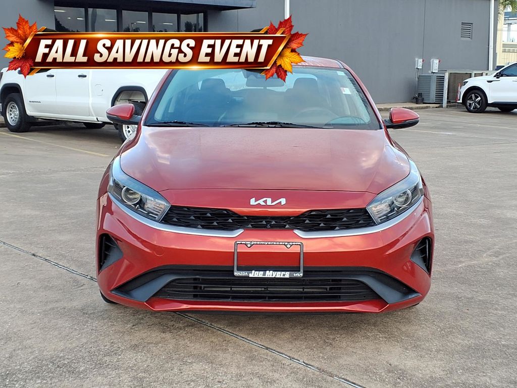 Certified Used 2023 Fire Orange Kia LXS image 7