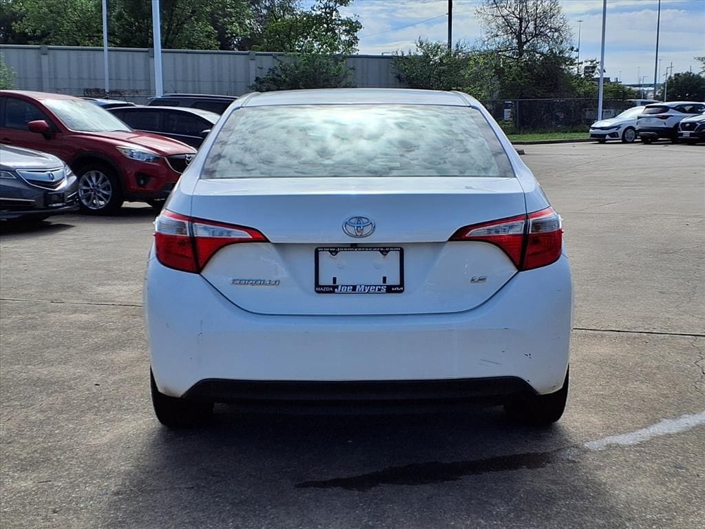 Used 2016 Super White Toyota LE image 8