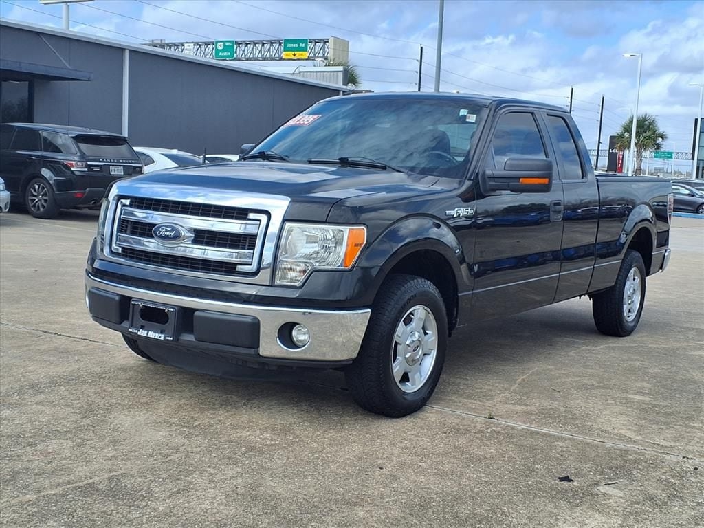 Used 2013 Tuxedo Black Metallic Ford XLT image 2
