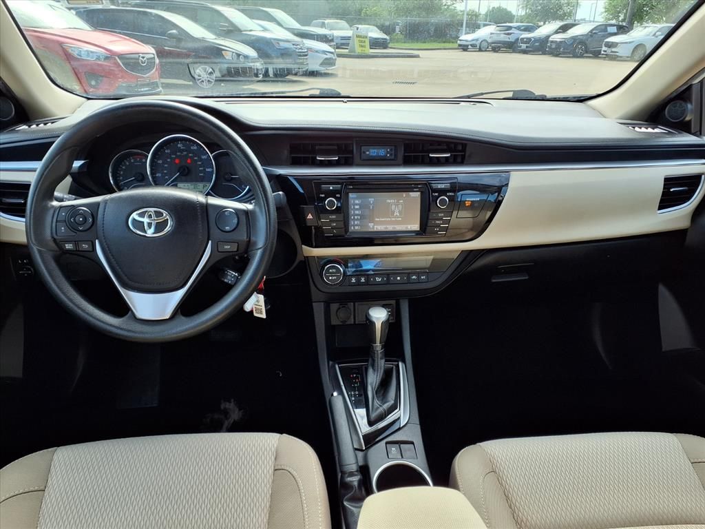 Used 2016 Super White Toyota LE image 9