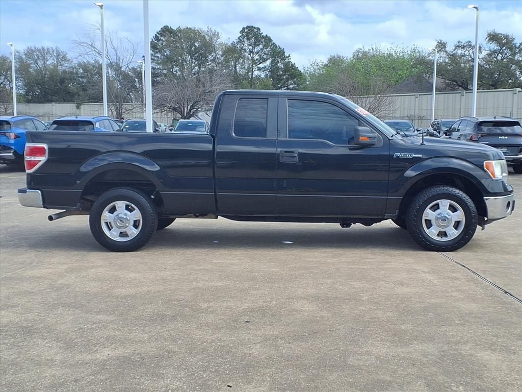 Used 2013 Tuxedo Black Metallic Ford XLT image 28