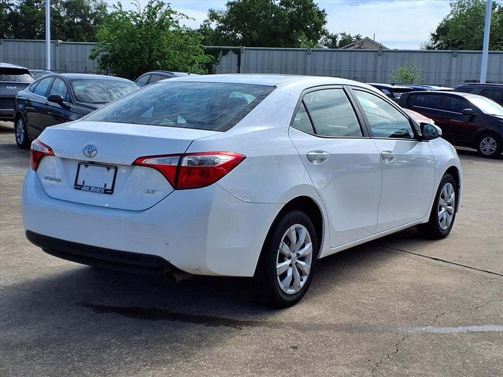Used 2016 Super White Toyota LE image 4