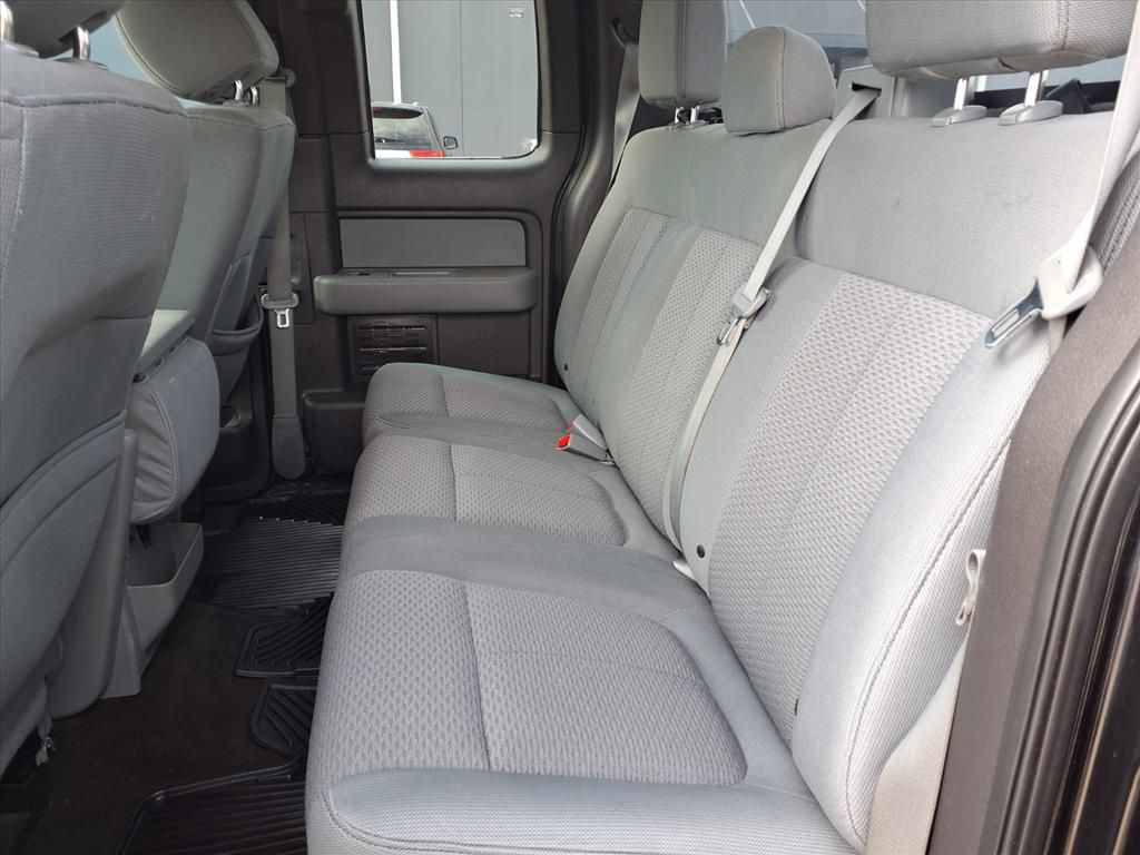 Used 2013 Tuxedo Black Metallic Ford XLT image 8