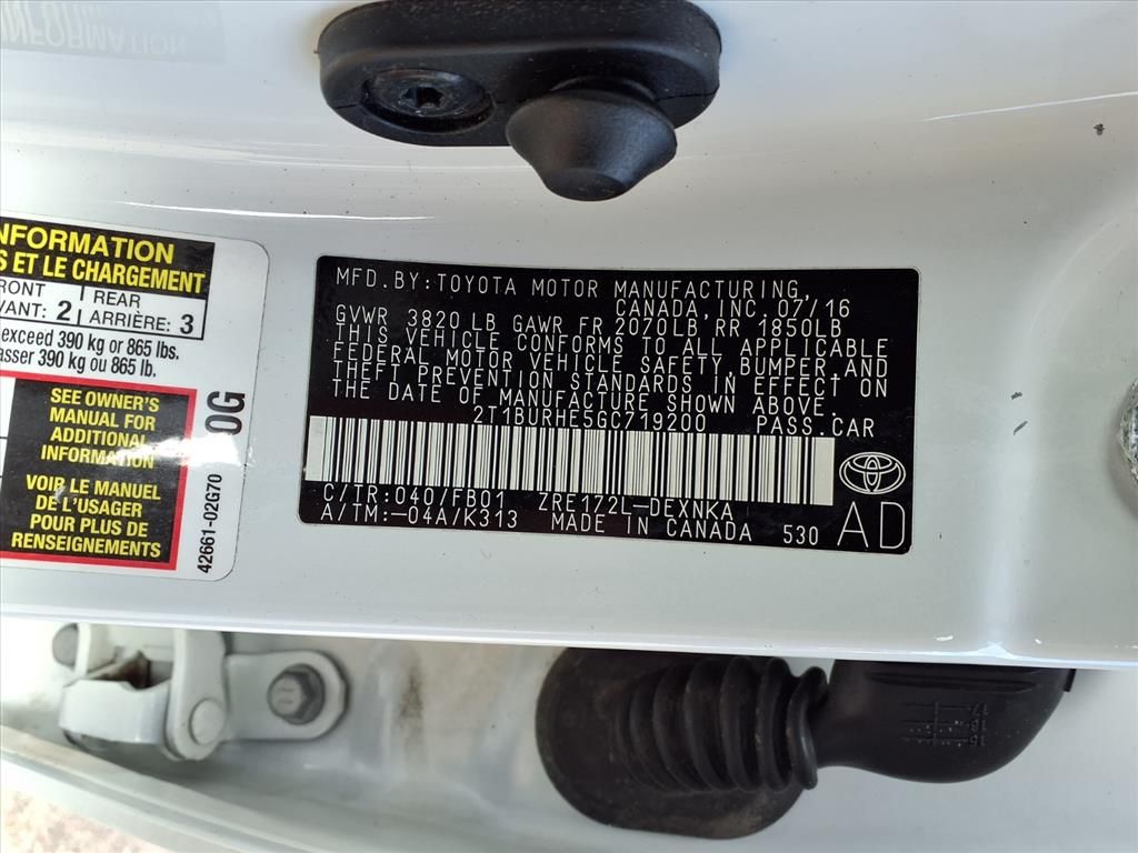 Used 2016 Super White Toyota LE image 12