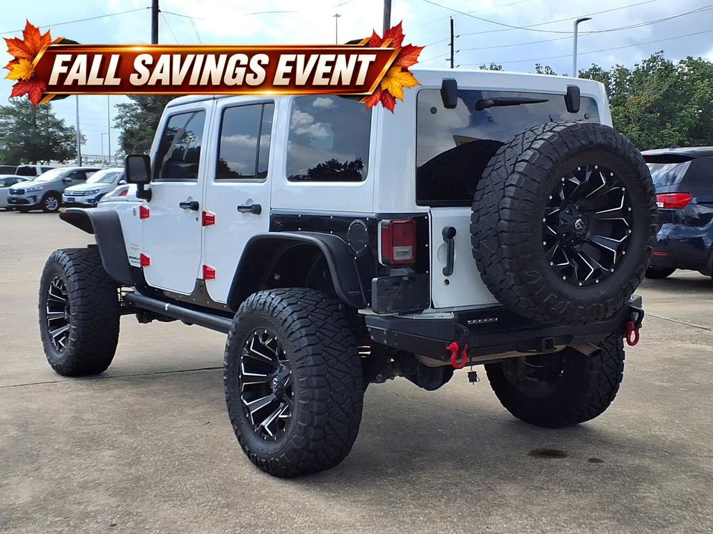 Used 2013 Bright White Clearcoat Jeep Unlimited Sahara image 2
