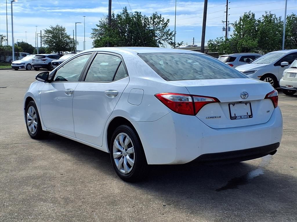 Used 2016 Super White Toyota LE image 2