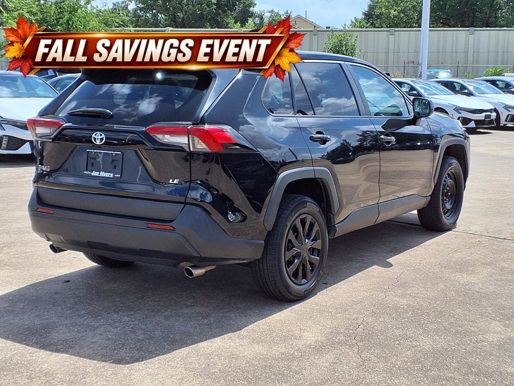 Used 2023 Midnight Black Metallic Toyota LE image 4