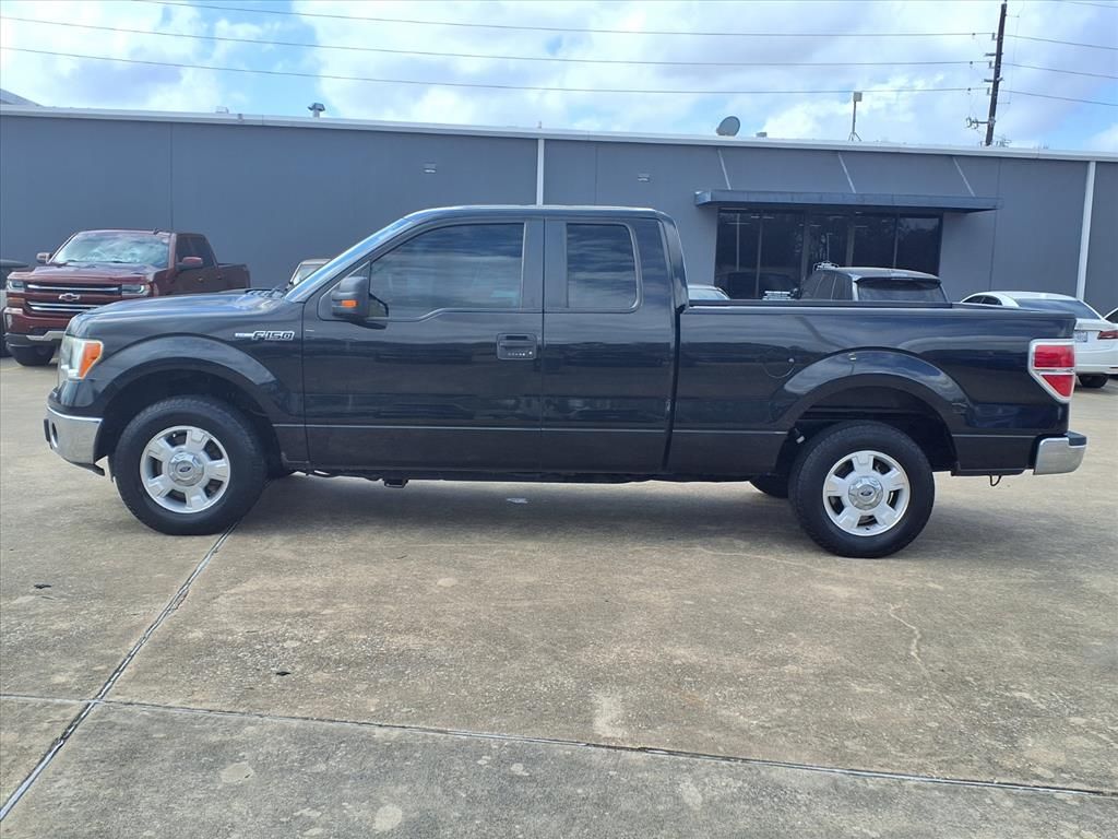Used 2013 Tuxedo Black Metallic Ford XLT image 26