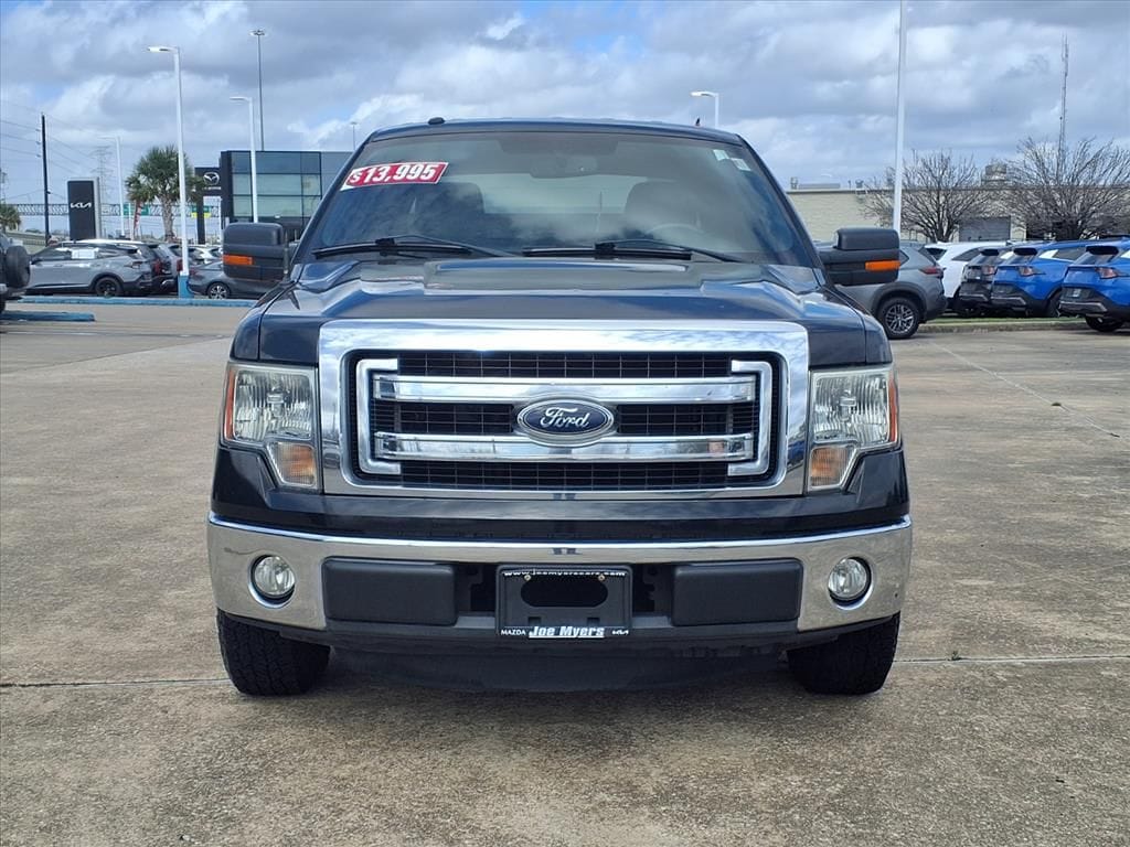 Used 2013 Tuxedo Black Metallic Ford XLT image 25
