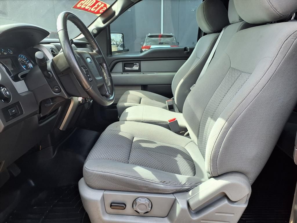 Used 2013 Tuxedo Black Metallic Ford XLT image 6