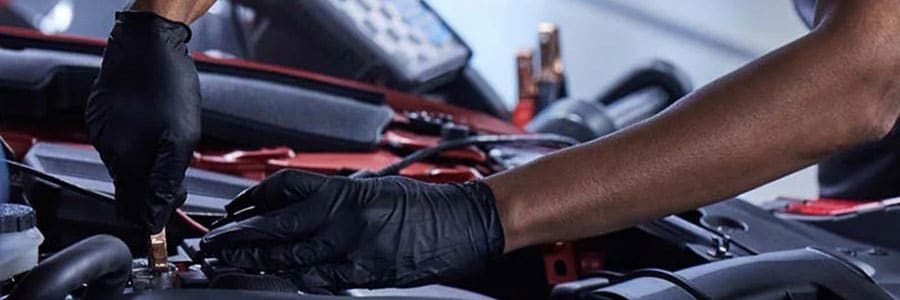 Man replacing a car battery