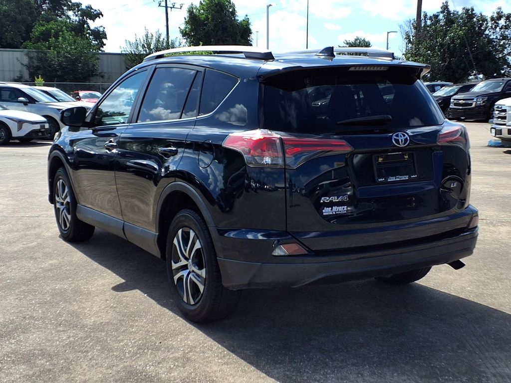 Used 2018 Toyota RAV4 LE with VIN 2T3ZFREV0JW504110 for sale in Jersey Village, TX