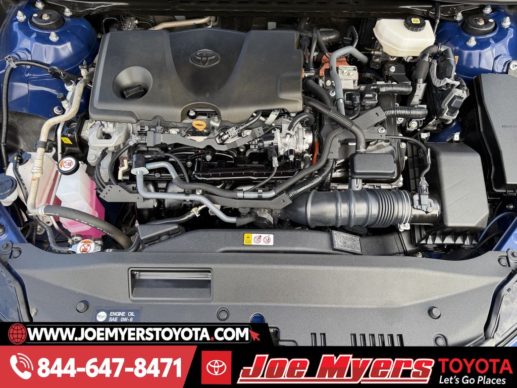 Used 2025 Reservoir Blue Toyota LE image 30