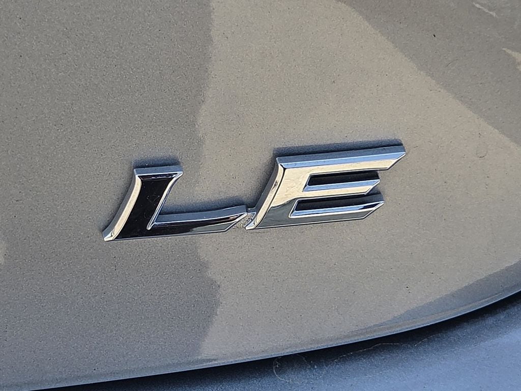 Used 2025 Celestial Silver Metallic Toyota LE image 11