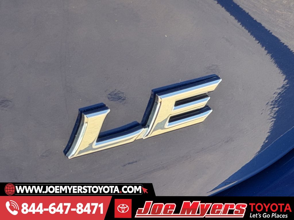 Used 2025 Reservoir Blue Toyota LE image 11