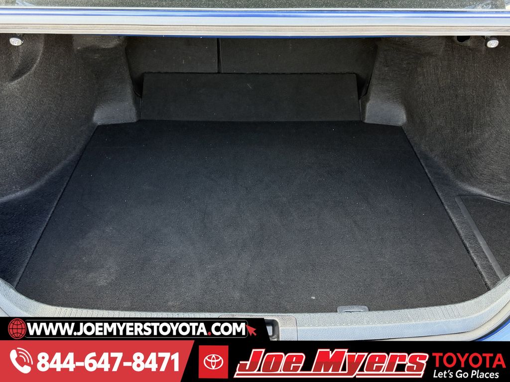 Used 2025 Reservoir Blue Toyota LE image 29