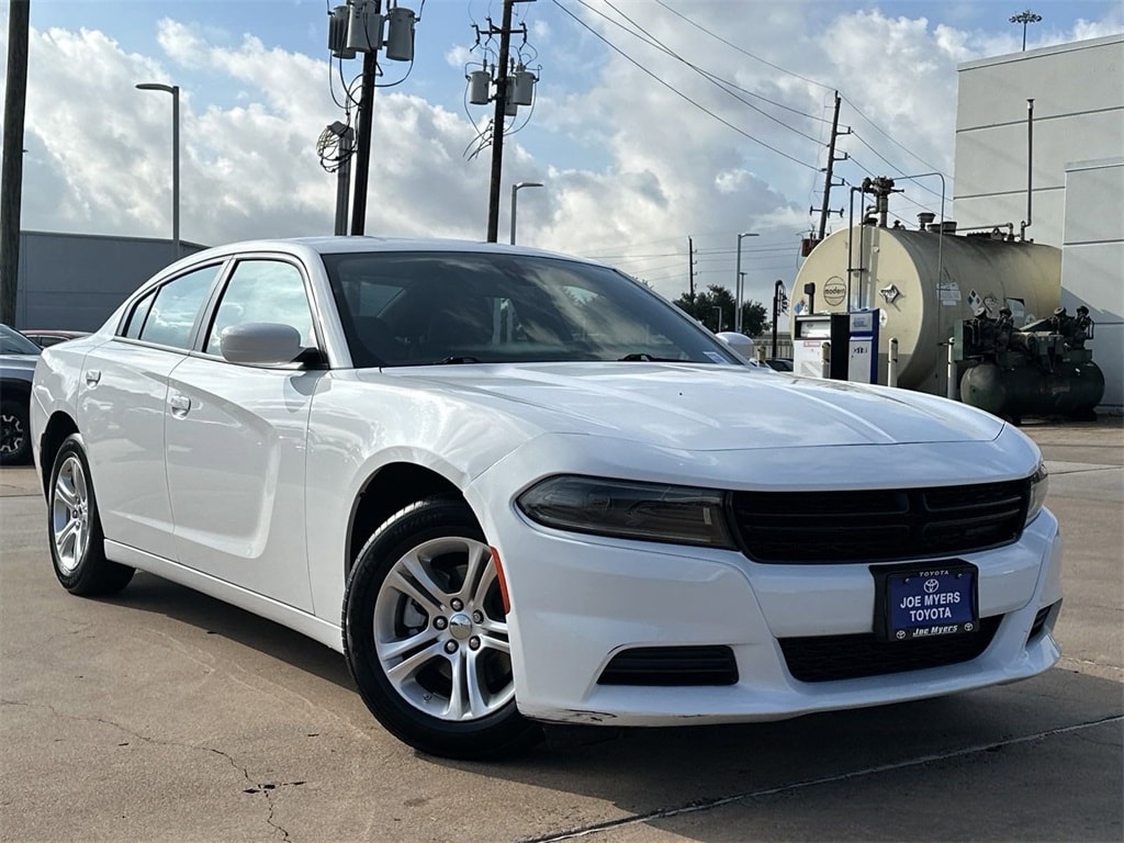 Used 2022 Dodge Charger SXT with VIN 2C3CDXBG9NH207692 for sale in Houston, TX