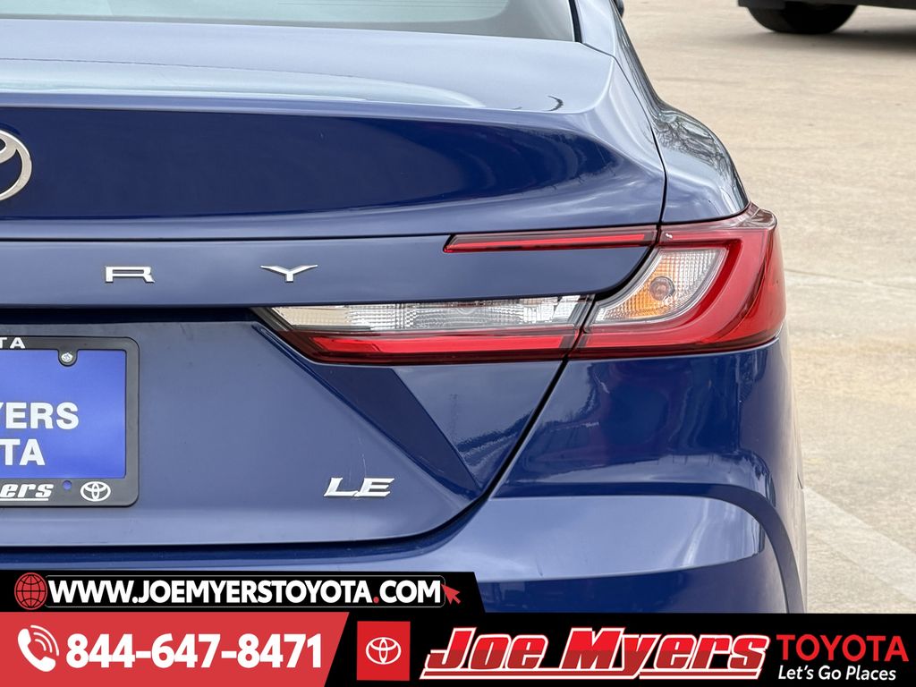 Used 2025 Reservoir Blue Toyota LE image 9