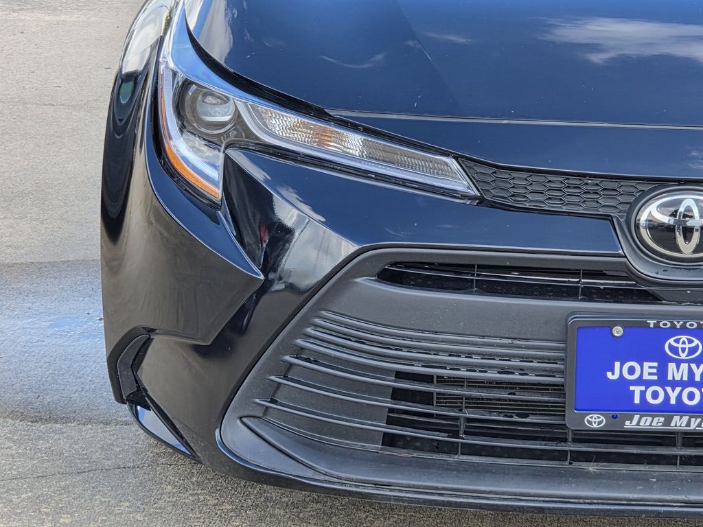 Used 2025 Midnight Black Metallic Toyota LE image 5