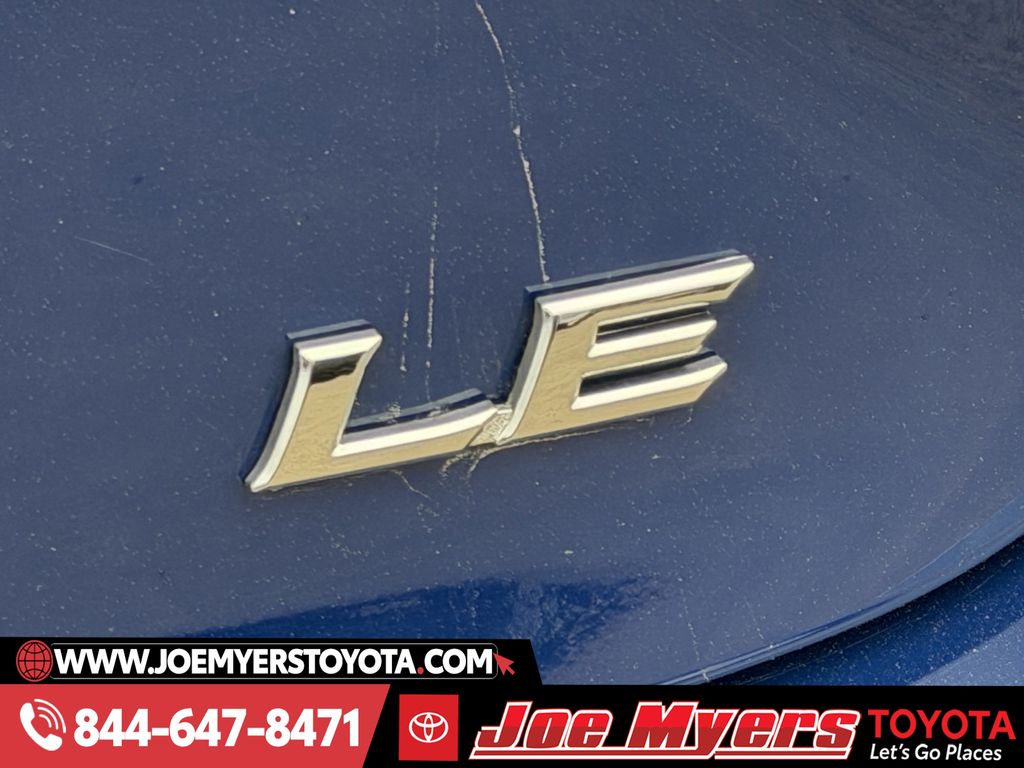 Used 2025 Reservoir Blue Toyota LE image 11