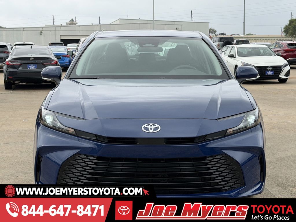 Used 2025 Reservoir Blue Toyota LE image 12
