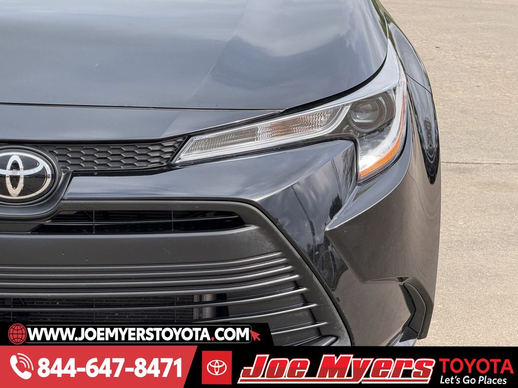 Used 2025 Midnight Black Metallic Toyota LE image 4