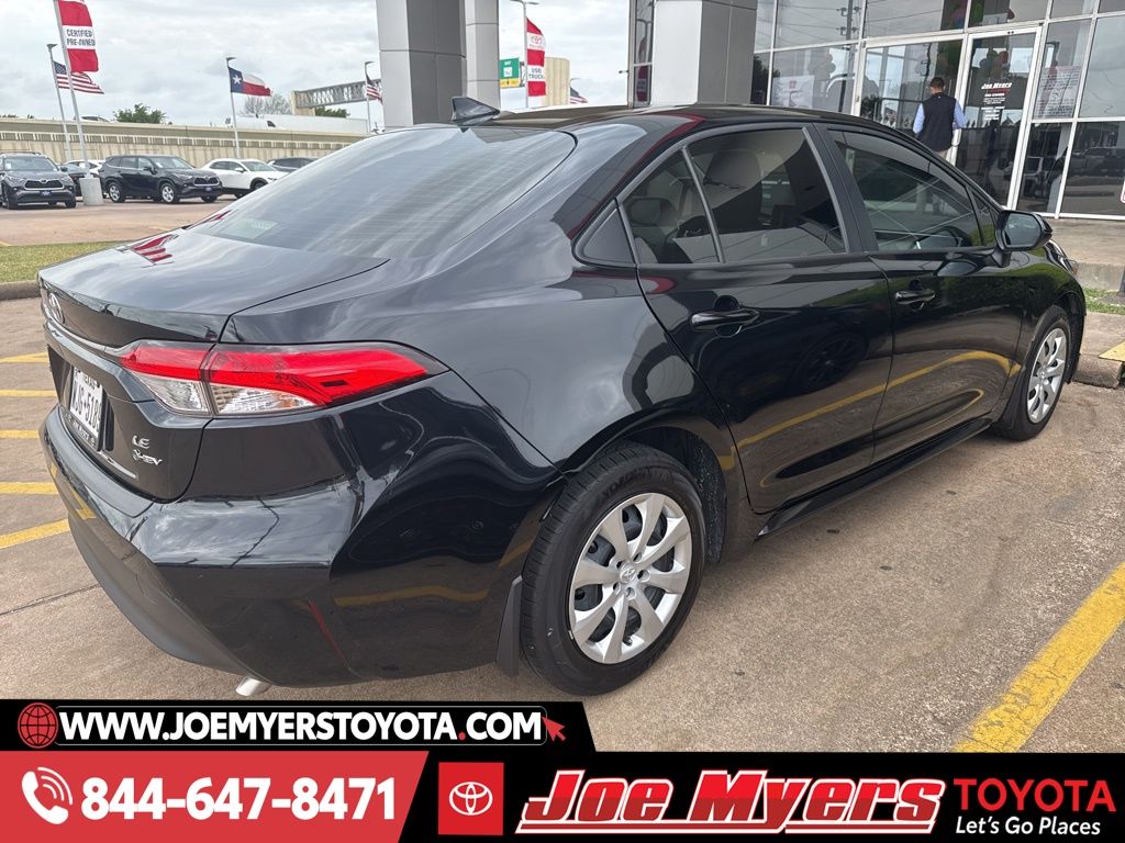 Used 2025 Midnight Black Metallic Toyota LE image 2