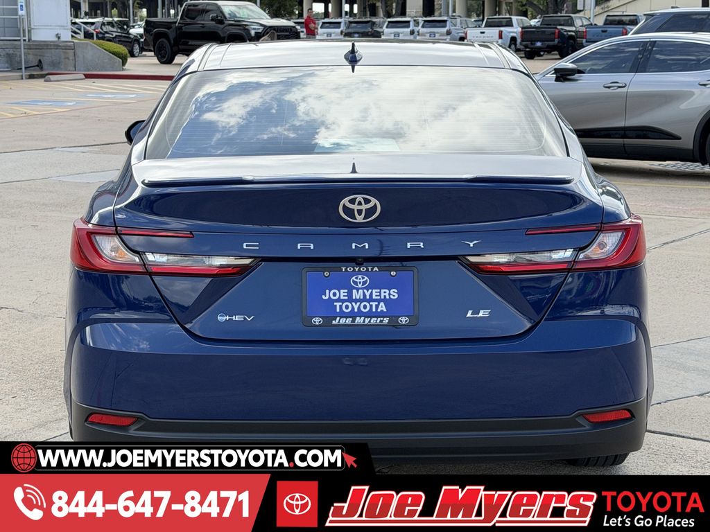 Used 2025 Reservoir Blue Toyota LE image 8