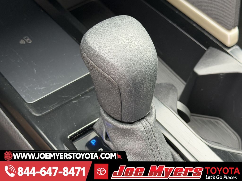 Used 2025 Reservoir Blue Toyota LE image 22