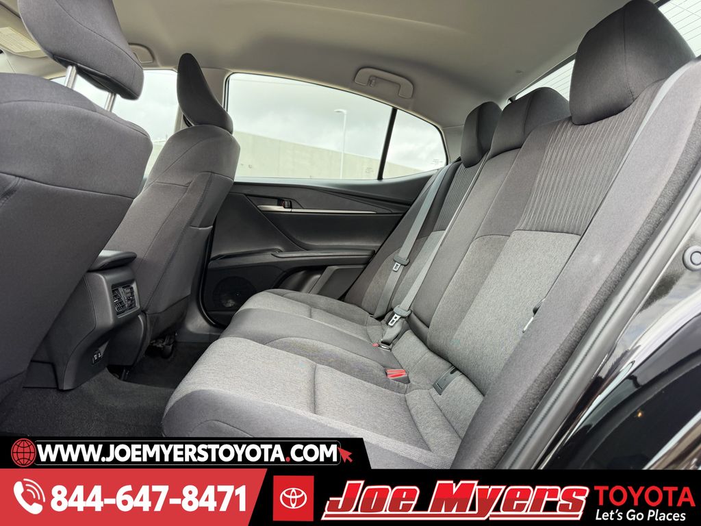 Used 2025 Midnight Black Metallic Toyota LE image 28