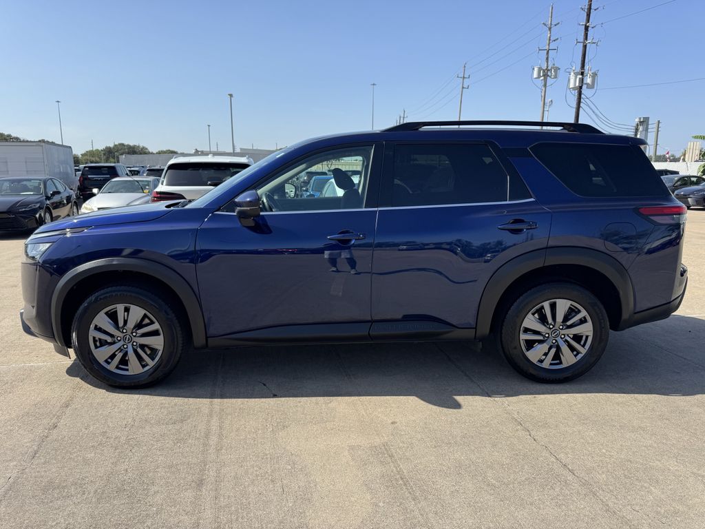 Used 2025 Deep Ocean Blue Pearl Nissan SV image 4